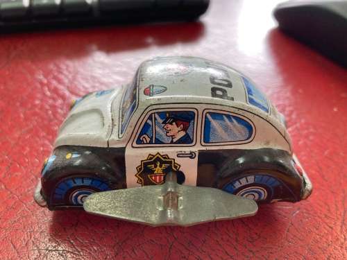 Tin police car - made in Japan possibly 1950s working winding mechanism