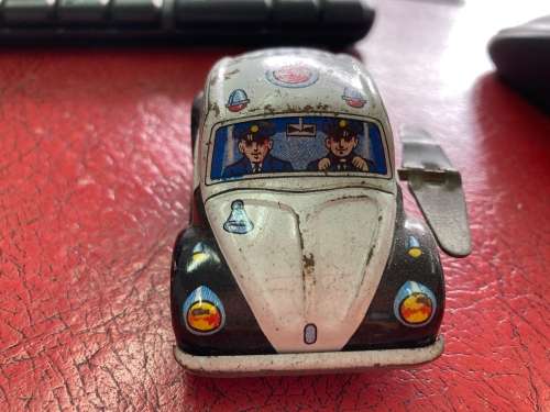 Tin police car - made in Japan possibly 1950s working winding mechanism