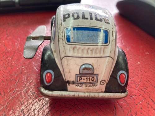 Tin police car - made in Japan possibly 1950s working winding mechanism