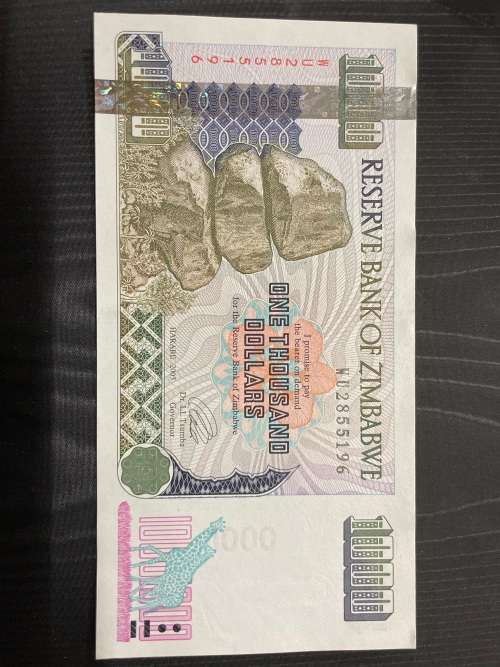 Zimbabwe , $1000 issued 2007 crisp and clear fields