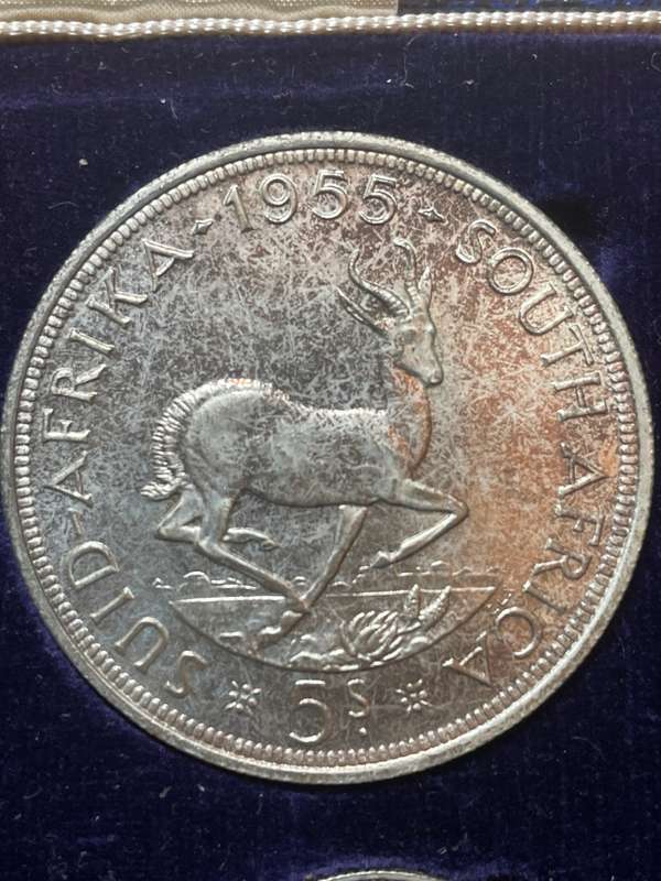 1955 short proof set-from toning seems untouched. crown is magnificent- has been very well preserved