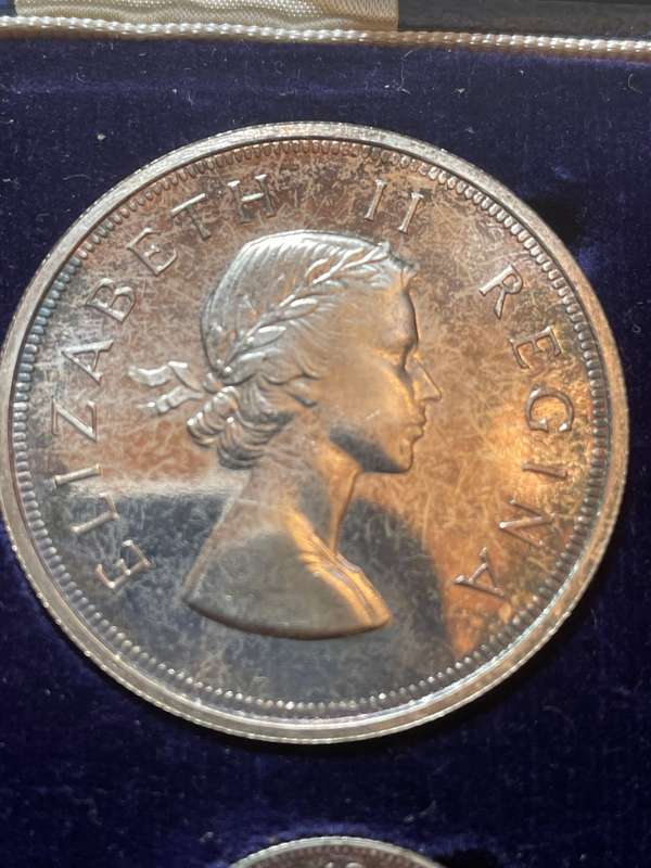 1955 short proof set-from toning seems untouched. crown is magnificent- has been very well preserved