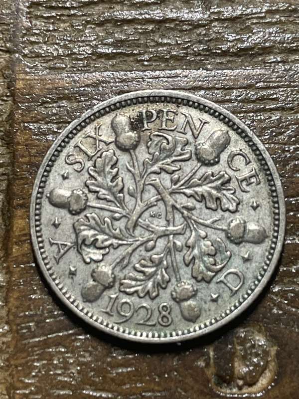 1928 King George six pence *** decent condition