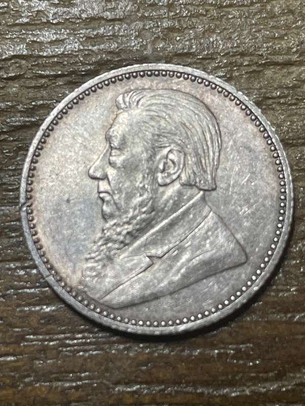 1897 * 6 pence * at least au