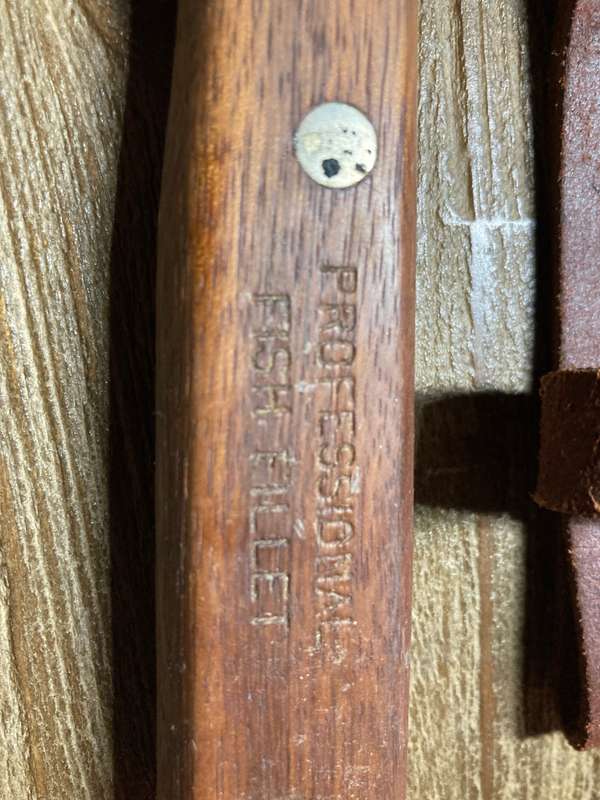 fish fillet  with leather sheath