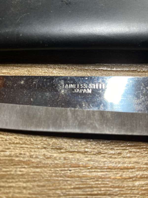Japanese knife with leather sheath