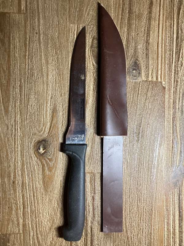 Boning knife in leather sheath