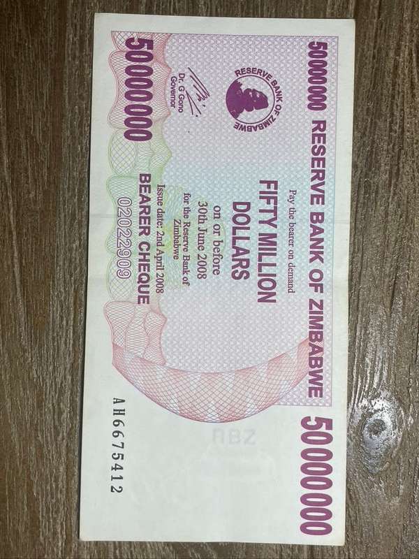 Zimbabwe  ***  50 million  ***  2008 Bearer Cheque  ***  Very collectable and crisp