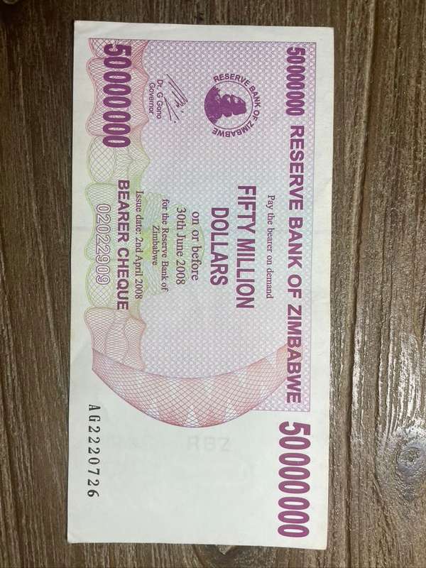 Zimbabwe  ***  50 million  ***  2008 Bearer Cheque  ***  Very collectable and crisp
