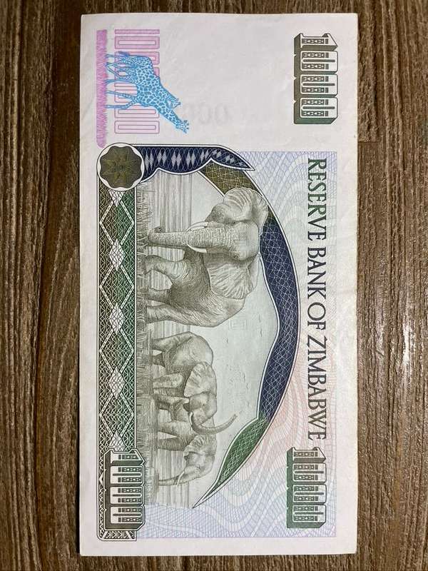 Zimbabwe  *  $1000  *    *  au condition