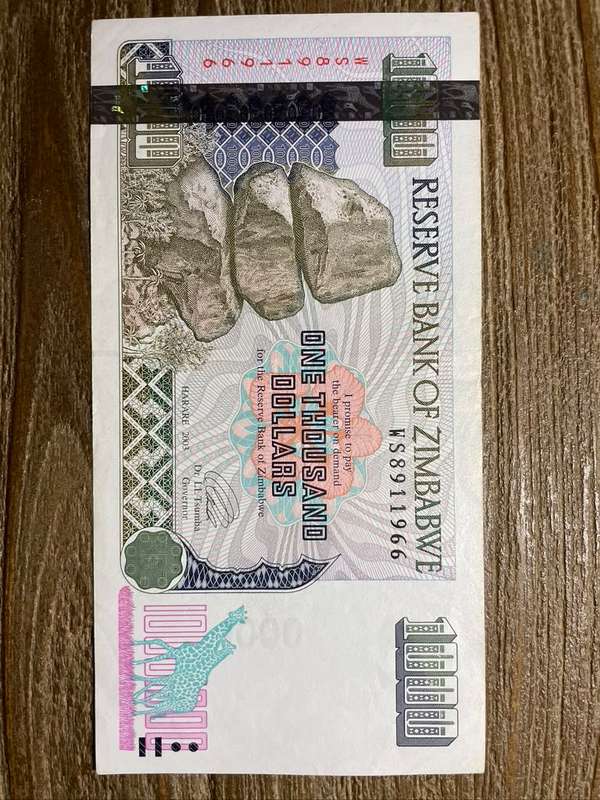 Zimbabwe  *  $1000  *    *  au condition