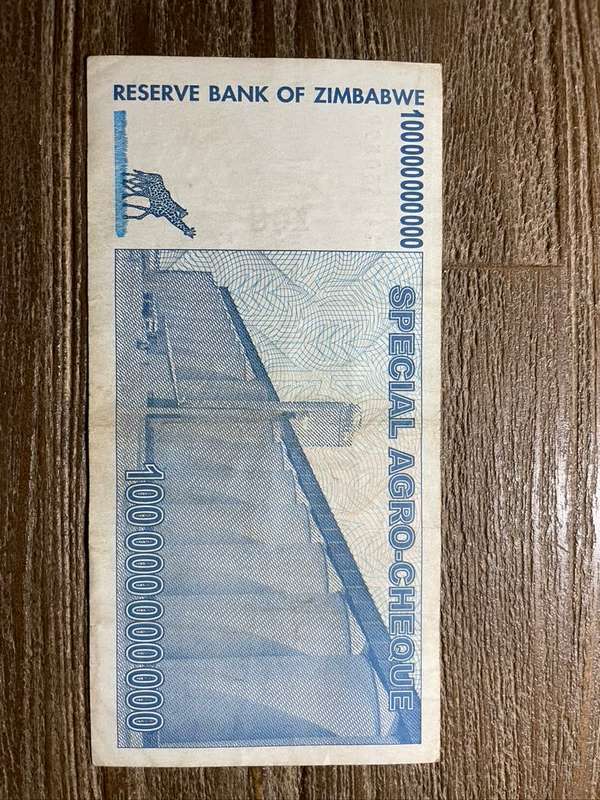 Zimbabwe  *  100 billion  *  2008 bearer cheque  *  please refer to picture for grade