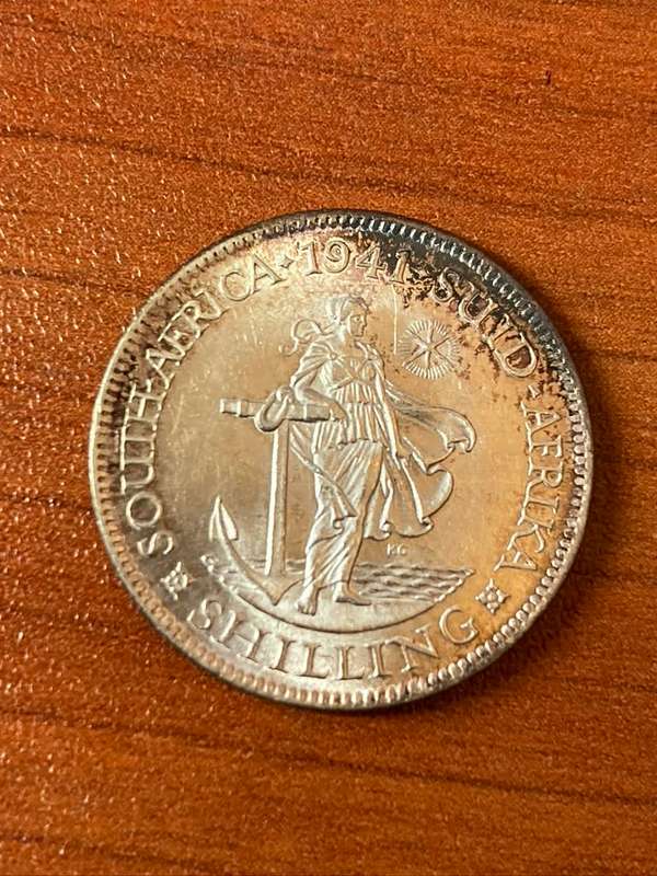 1942 *** Shilling *** Definite unc, there should be only a few better