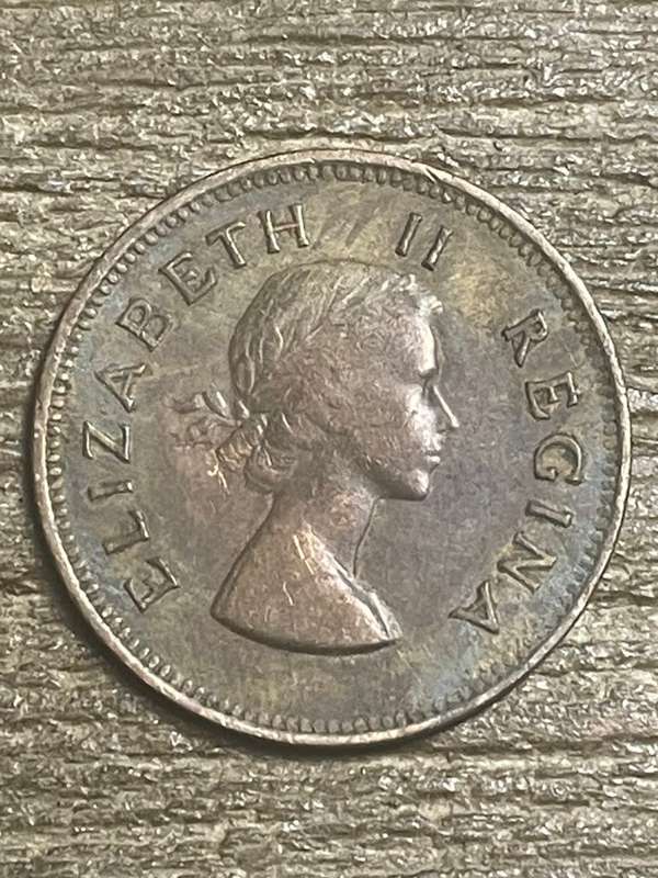 1955 *** 1/2 Penny *** the top stains can removed as coin better than picture