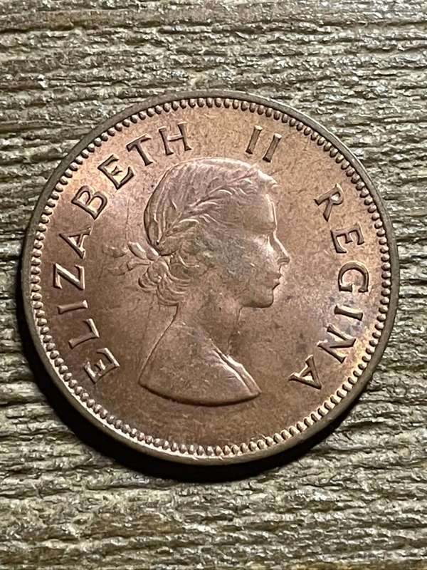 1957 *** 1/2 Penny *** Unc dealer stock