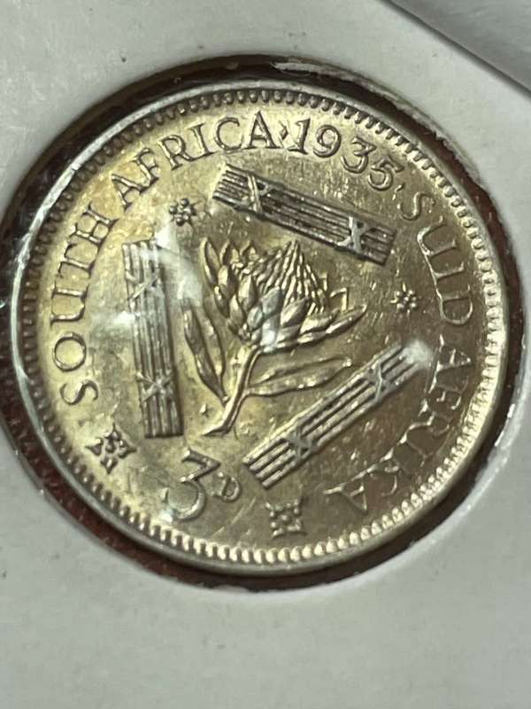 1935 *** 3P *** Top uncirculated coin, grade this coin