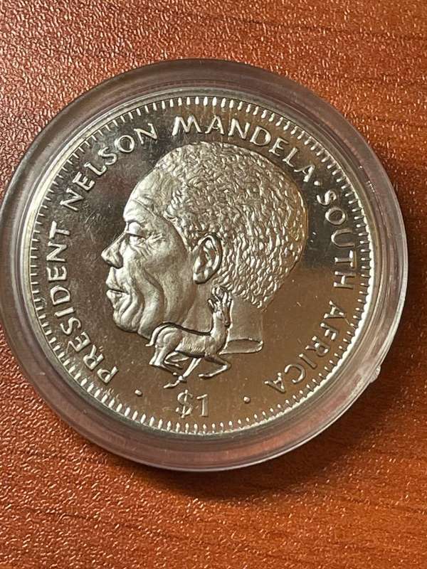 Liberia  *** Mandela $1 *** untouched in a capsule