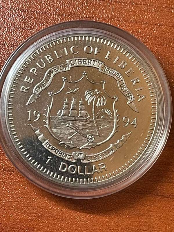 Liberia  *** Mandela $1 *** untouched in a capsule