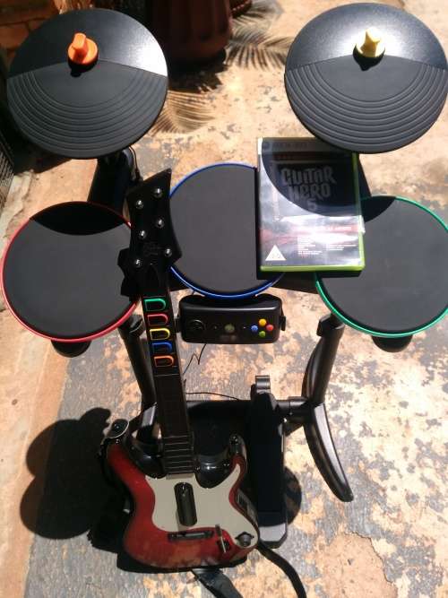 GUITAR HERO 5 GAME,  DRUM SET + GUITAR BUNDLE  FOR XBOX 360 CONSOLES- SET IS LIKE BRAND NEW!!!