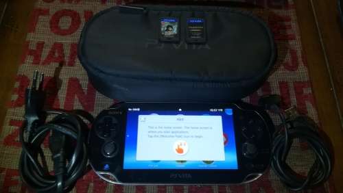 PS VITA 3G/WIFI (PCH-1104) WITH 2 GAMES + SONY POUCH