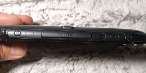 PS VITA SLIM CONSOLE (NEEDS SLIGHT TLC/REPAIR)