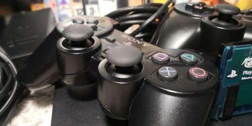 SONY PS2 SLIM WITH 2 CONTROLLERS AND 10 GAMES - BUNDLE IS IN SUPERB CONDITION!