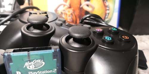 SONY PS2 SLIM WITH 2 CONTROLLERS AND 10 GAMES - BUNDLE IS IN SUPERB CONDITION!