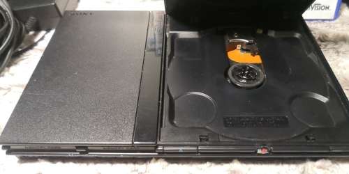 SONY PS2 SLIM WITH 2 CONTROLLERS AND 10 GAMES - BUNDLE IS IN SUPERB CONDITION!