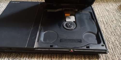 PS2 SLIM CONSOLE WITH 2 CONTROLLERS AND 10 GAMES