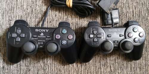 PS2 SLIM CONSOLE WITH 2 CONTROLLERS AND 10 GAMES