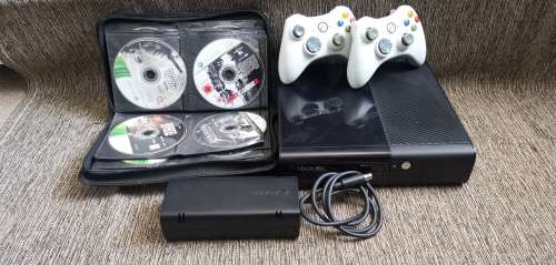 Xbox 360 Console with 2 controllers and 32 games