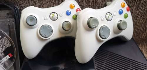 Xbox 360 Console with 2 controllers and 32 games