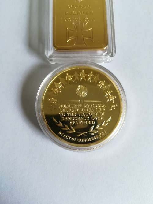 Coins and Medallions from deseased estate up for Snap Friday Auction.