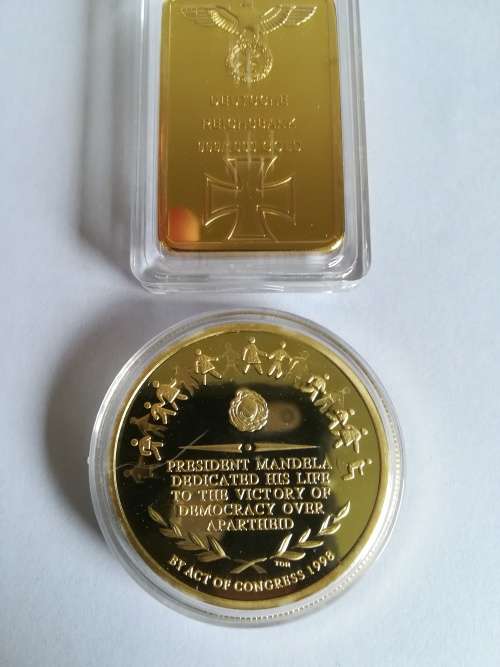 Coins and Medallions from deseased estate up for Snap Friday Auction.