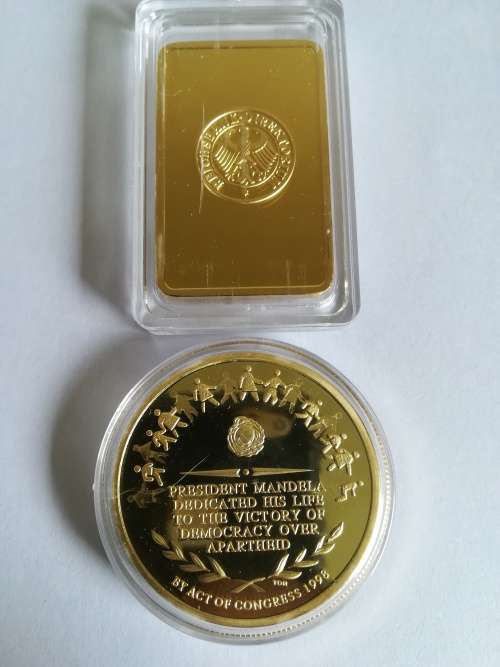 Coins and Medallions from deseased estate up for Snap Friday Auction.