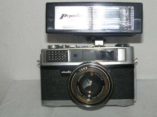 MINOLTA AL WITH FLASH & A CONVERSION LENSE SET