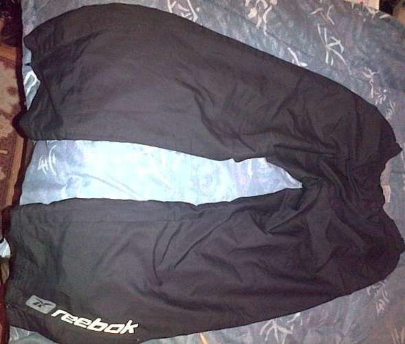 Reebok Pants with zips on bottom of legs - size Small