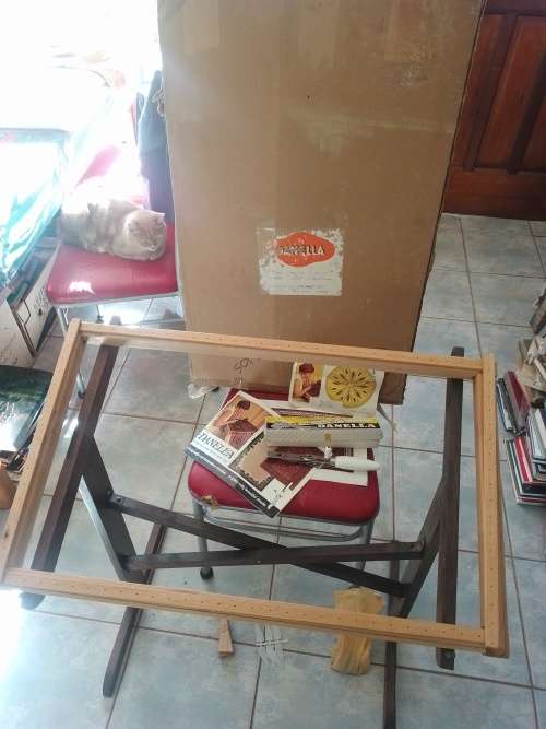 Danella carpet needle and wooden stand and frame with instruction book. Used to make rugs