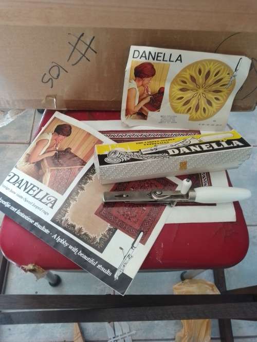 Danella carpet needle and wooden stand and frame with instruction book. Used to make rugs