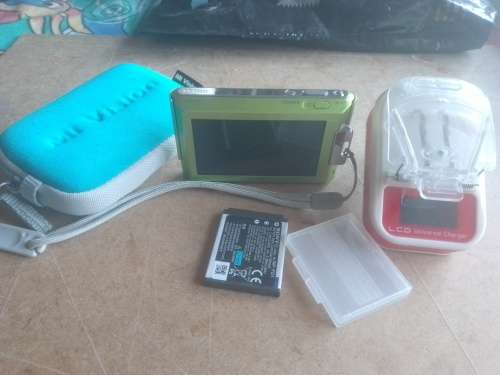 Sony Cybershot DSC-T77 touch screen digital camera with LCD universal charger   Colour: Green