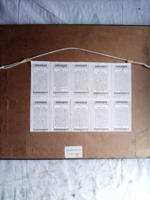 Cigarette cards neatly mounted in smart wooden frames