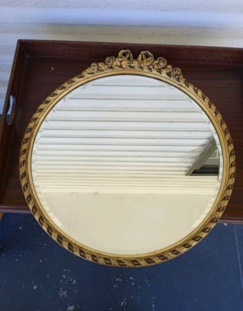 Mirror - Bevel glass, with gold wood frame Round ornate mirror. 54cm wide and 3cm thick