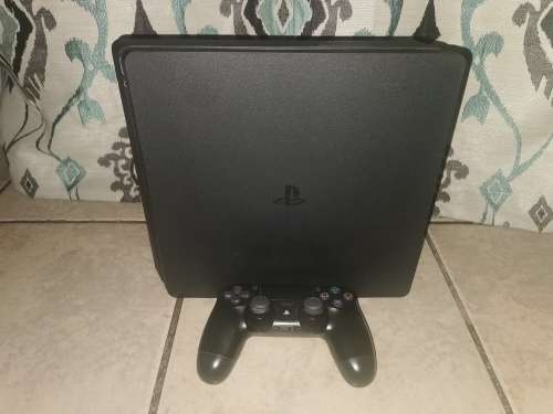 Playstation 4 Slim Line 1 Terabyte and Games