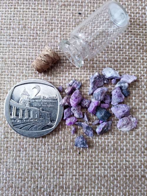 Tiny Sugilite chips in small bottle - various quality - Rare!