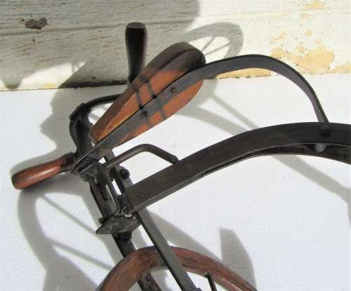 STURDY WOOD AND METAL OLD LOOKING TRICYCLE WHEELS TURN DISPLAY ITEM
