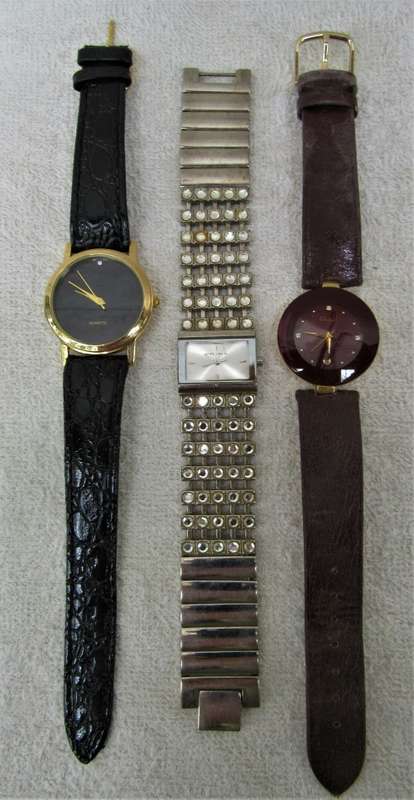 AMAZING COLLECTION QUALITY WOMANS WRIST WATCHES, ONE HAS A REAL DIAMOND WOW!!!