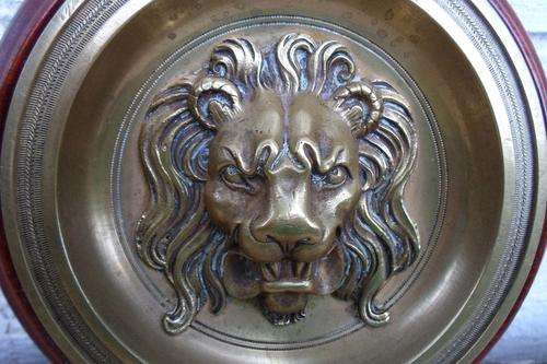 VERY OLD ARCHITECTURAL BRASS LIONS HEAD PLAQUE SET IN SOLID MAHOGANY FRAME