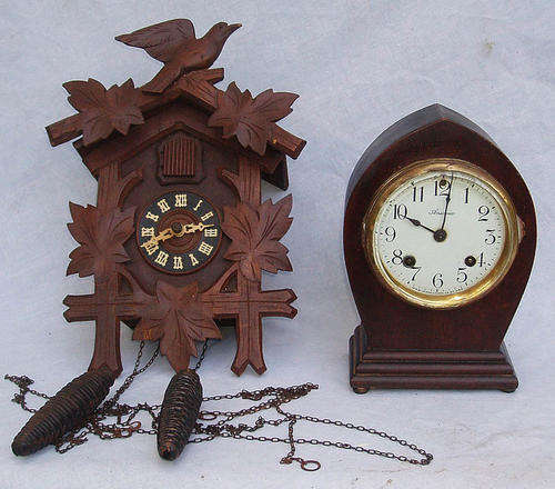 2 4 THE PRICE OF 1~VINTAGE CUCKOO CLOCK~PLUS ANTIQUE AMERICAN ANSONIA~BOTH WORK~BUT........