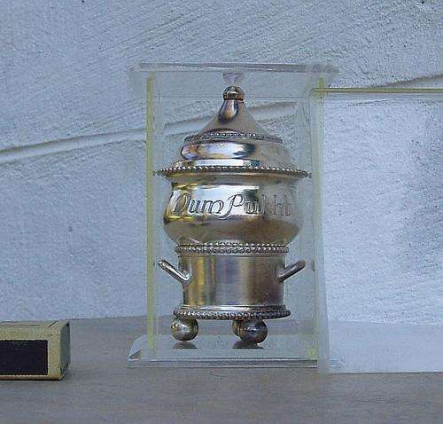 THIS WEEKS MYSTERY ITEM~DUM PUHKT~METAL CONTAINER ITEM IN CASE?