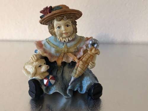 BEAUTIFUL PAIR OF UNGLAZED CERAMIC VINTAGE GIRLS